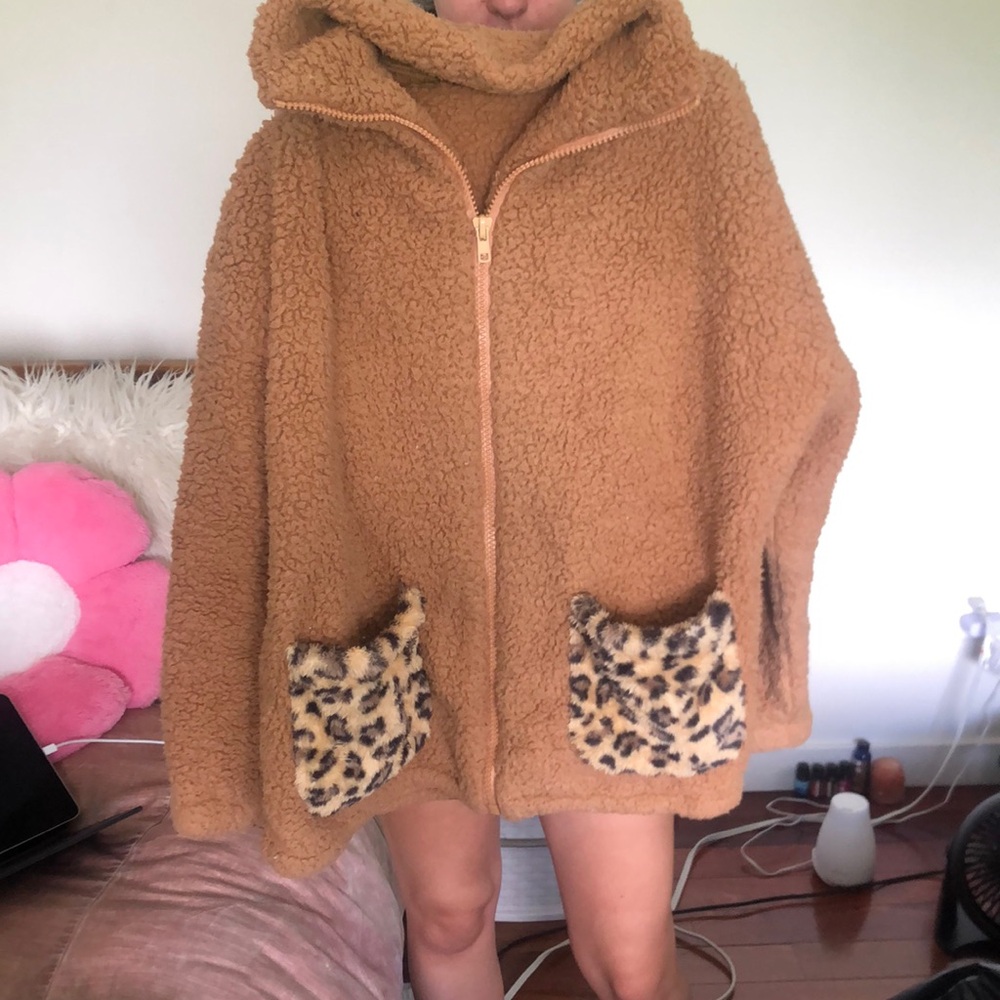 light brown teddy bear jacket with cheetah print pockets